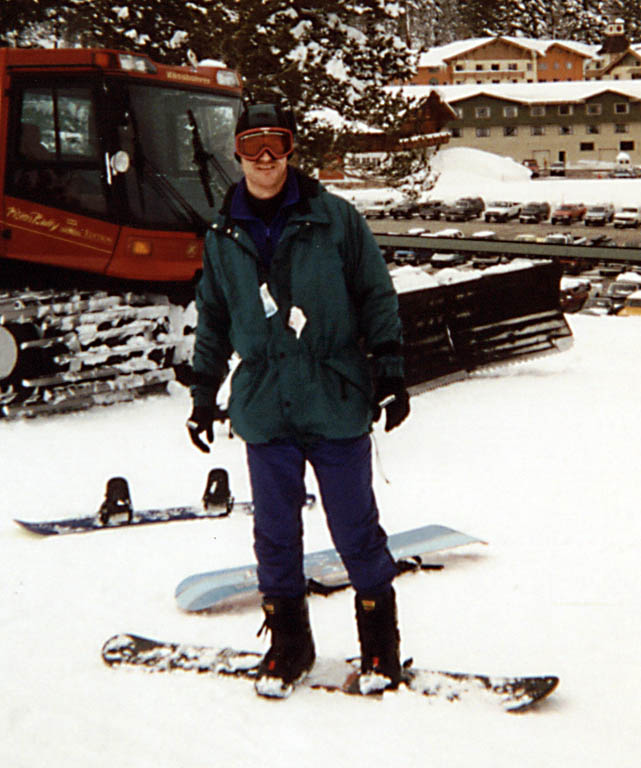 On a snowboard for the first time. (Category:  Skiing)