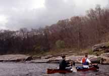 Me and Will bailing our canoe. (Category:  Paddling)