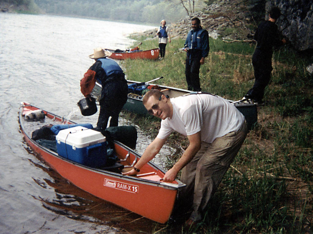 Me and Josh bailing our canoe. (Category:  Paddling)