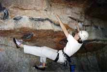 Sarah bouldering. (Category:  Rock Climbing)