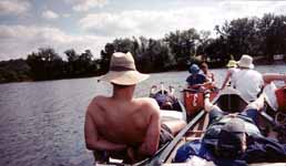 The group rafted up and relaxing. (Category:  Paddling)