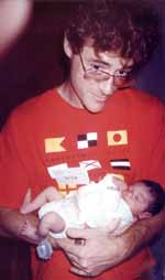 Me holding a one-day-old Nassor. (Category:  Family)