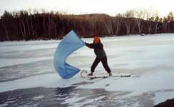 Marci toboggan sailing. (Category:  Skiing)