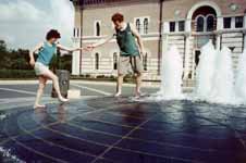 Marci and me exploring a new fountain at Rice University. (Category:  Travel)