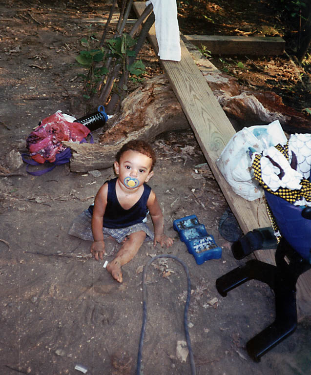 Nassor enjoying the dirt. (Category:  Rock Climbing)