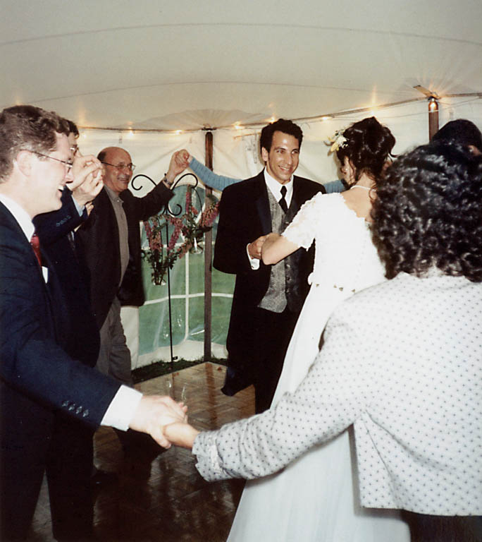 Jonathan and Beth dancing at their wedding with Andy and Marci in the foreground. (Category:  Party)