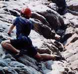 Marci busting out some serious moves on Kra'Vak Attack at Annapolis Rocks. (Category:  Rock Climbing)