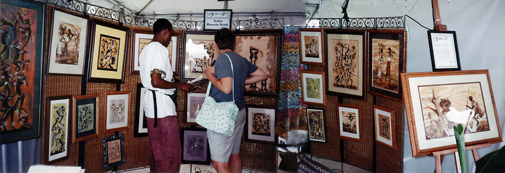 Hussein in his booth (Category:  Family)