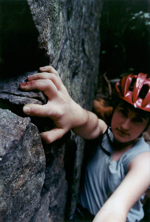 Lauren with bloody hands. (Category:  Rock Climbing)