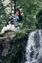 Sophia, Hussein, Rachel and Nassor above a waterfall. (Category:  Hiking)