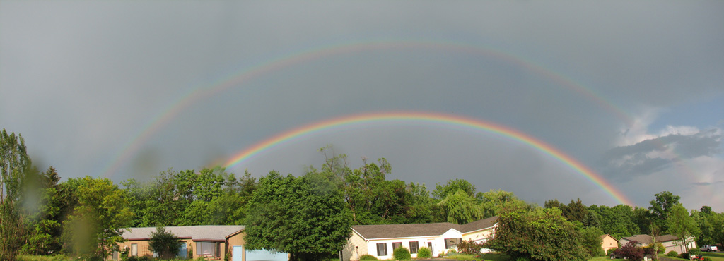 It was actually a double rainbow.  This panorama gives some idea of what it looked like. (Category:  Residence)