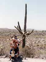 Family impersonation of a saguaro cactus. (Category:  Family)