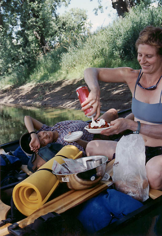 Jinmi watching Liz prepare a feast. (Category:  Paddling)