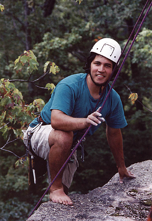 Vijay climbing barefoot. (Category:  Rock Climbing)