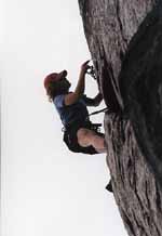 Lindsay setting an anchor. (Category:  Rock Climbing)