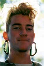Brian with his carabiner earrings up to 8mm in diameter... on the way to full size 10mm biners. (Category:  Rock Climbing)