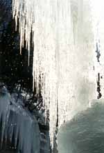 Ice curtain shimmering and melting in the sun. (Category:  Ice Climbing)