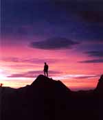 Tom silhouetted against the sunset. (Category:  Rock Climbing)