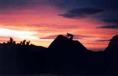 Me (or Tom?) silhouetted against the sunset. (Category:  Rock Climbing)