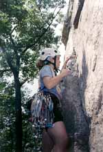 Lindsay starting to lead the first pitch of Maria. (Category:  Rock Climbing)