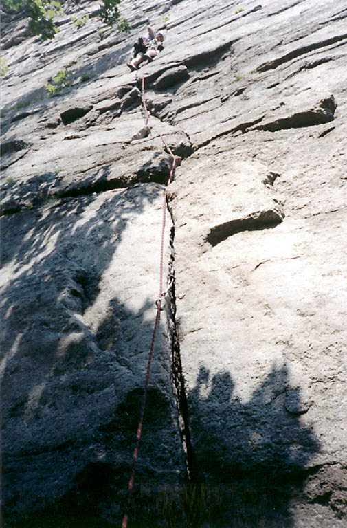 Lindsay up a way on the first pitch of Maria. (Category:  Rock Climbing)