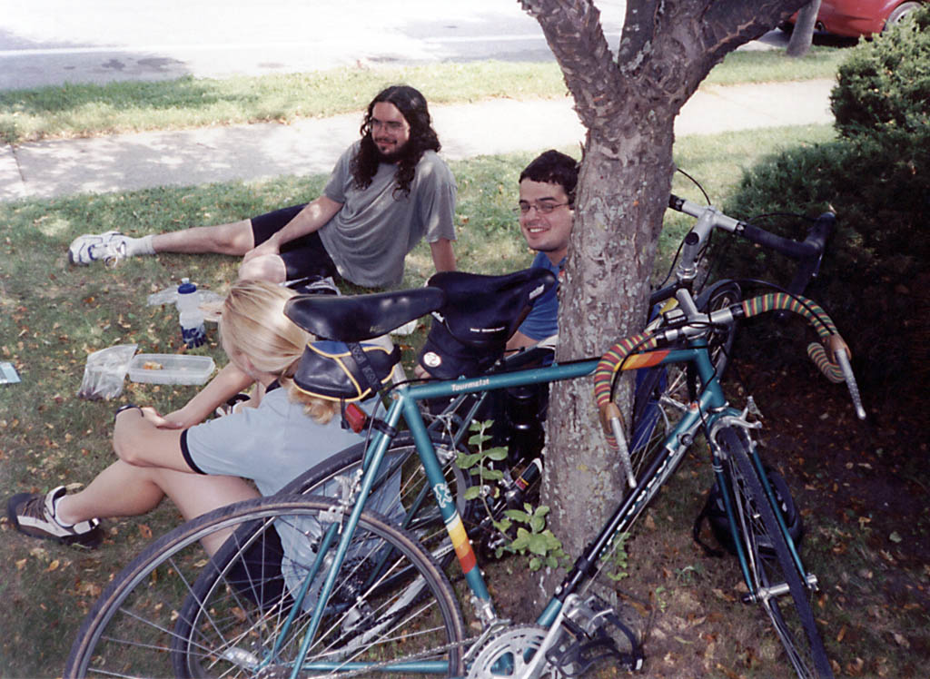 Melissa, Rich and Mark with Mark's colorful bike in the foreground. (Category:  Biking)