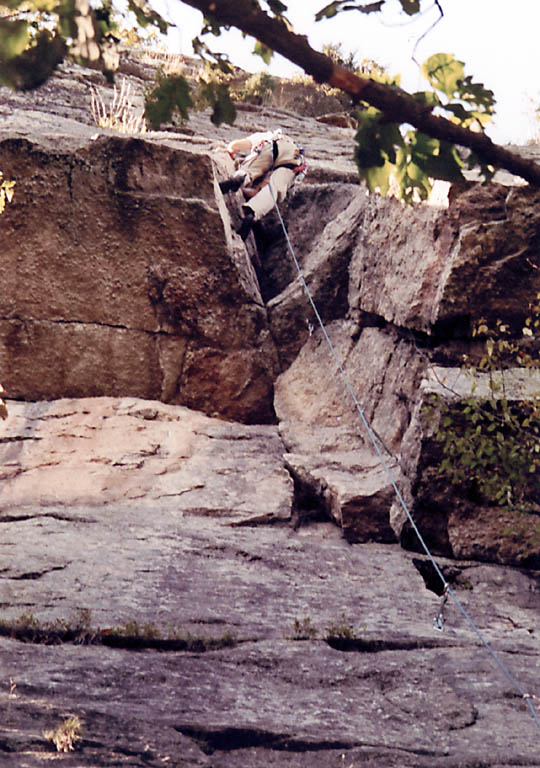 Pulling the crux of V-3. (Category:  Rock Climbing)