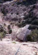 Lauren climbing the arete on the last pitch. (Category:  Rock Climbing)