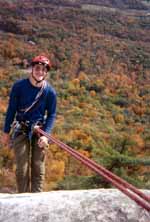 On rappel with some beautiful fall foliage below. (Category:  Rock Climbing)
