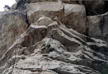 Joe finishing Twilight Zone, photographed from the belay. (Category:  Rock Climbing)