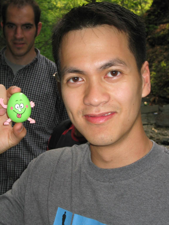 Anh with his prize from the first cache. (Category:  Hiking)