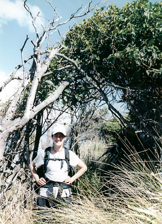 Lauren under an arch of trees. (Category:  Travel)