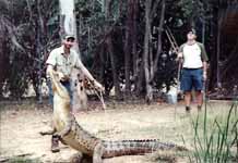 Requisite Crocodile stunt: Jumping for a chicken on a stick (Category:  Travel)