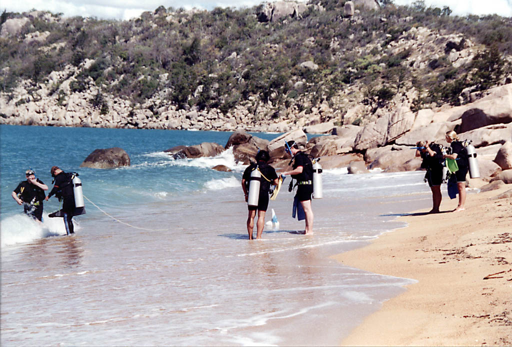 Scuba class heading into the ocean. (Category:  Travel)