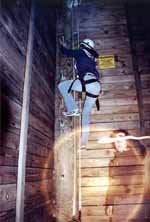 Climbing into the tower. (Category:  Ropes Course Climbing)