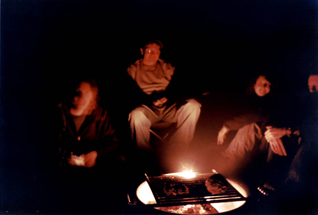 Sitting around the campfire. (Category:  Camping)