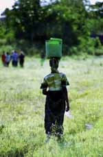 Woman carrying water. (Category:  Travel)