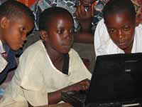 Fatuma and Habiba rapidly developing computer skills. (Category:  Travel)