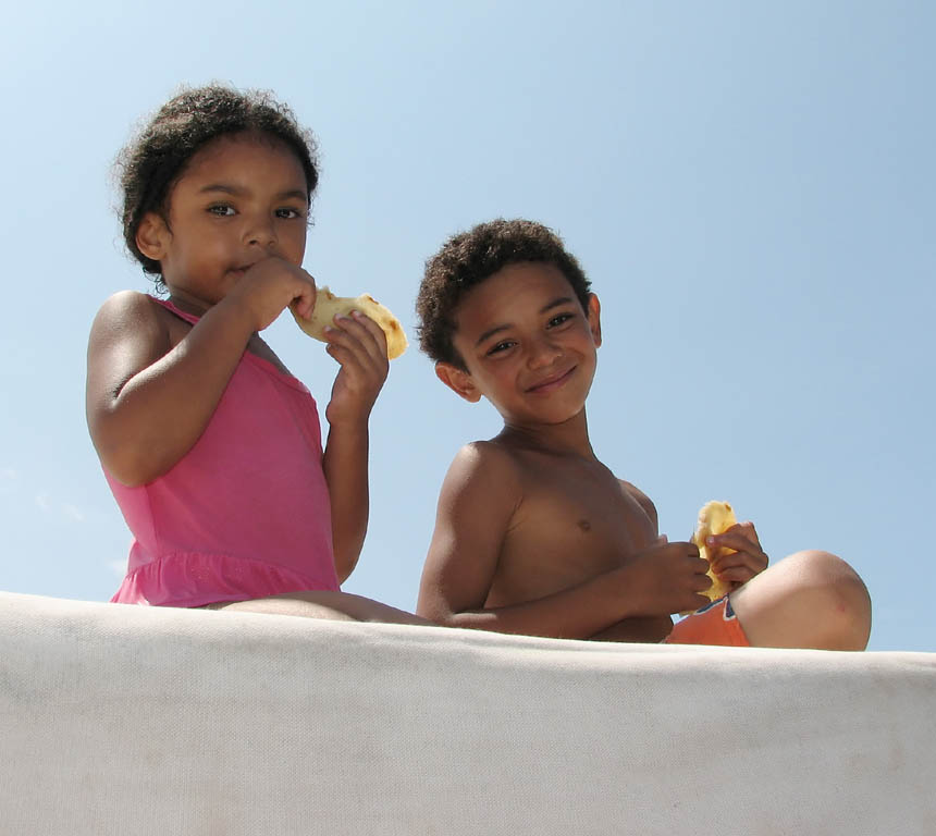 Sophia and Nassor on top of the dive boat. (Category:  Travel)