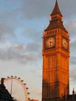 Clock Tower with the London Eye in the background. (Category:  Travel)