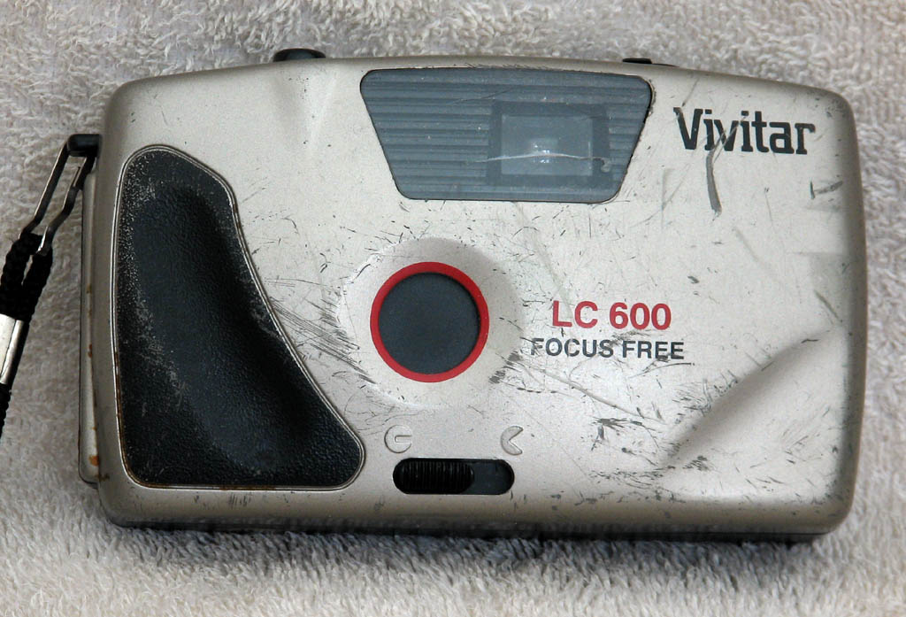 Vivitar fully manual film camera.  I've dragged this up a few rock climbs, and it really shows. (Category:  Photography)