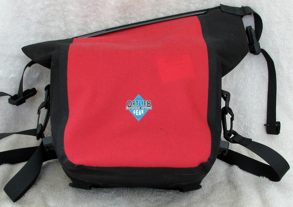 Ortlieb waterproof camera case.  Enough room for an SLR, three lenses, and assorted supplies. (Category:  Photography)