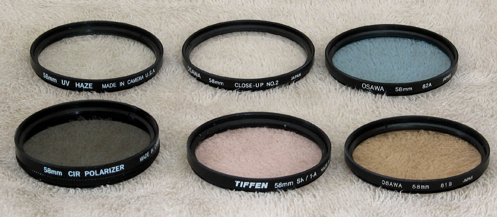 My 58mm filters (for the Canon lenses).  UV, Closeup #2, Circular Polarizer, Skylight, 82A, 81B. (Category:  Photography)