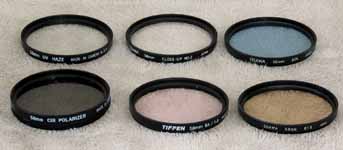 My 58mm filters (for the Canon lenses).  UV, Closeup #2, Circular Polarizer, Skylight, 82A, 81B. (Category:  Photography)