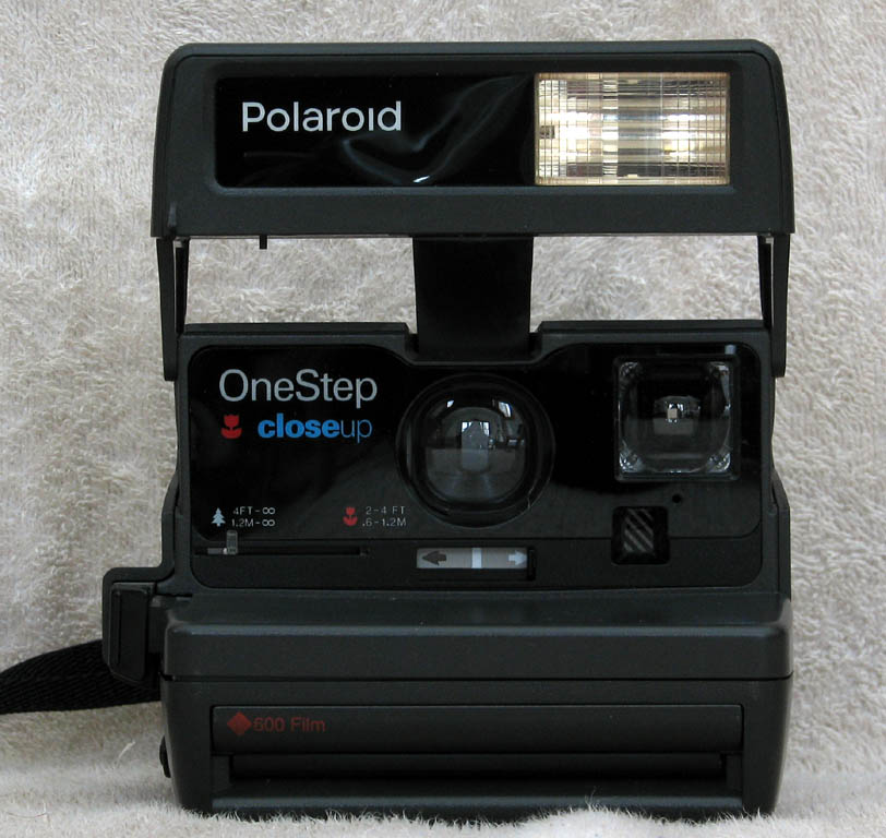 Polaroid instant camera.  I got this in a white elephant gift exchange.  Kinda fun! (Category:  Photography)