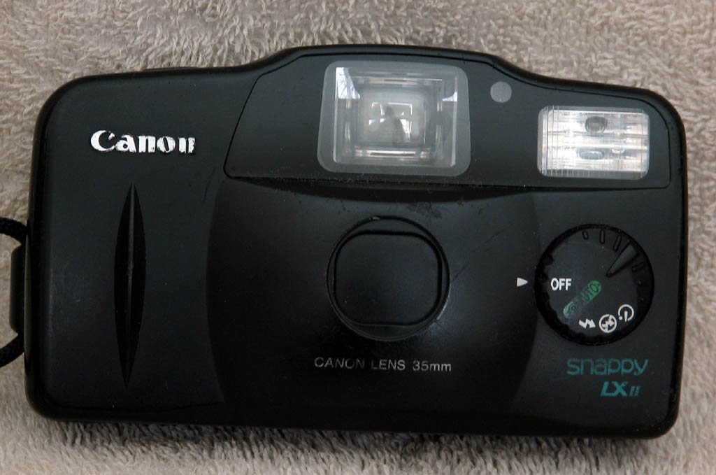 Canon snappy film camera.  Film is a real hassle, but sometimes you don't want to drag a good digital camera up a rock climb. (Category:  Photography)