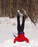 Headstand on skis.  Always a fun trick. (Category:  Skiing)