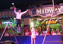 Slackliner on a unicycle at Circus Circus. (Category:  Rock Climbing)