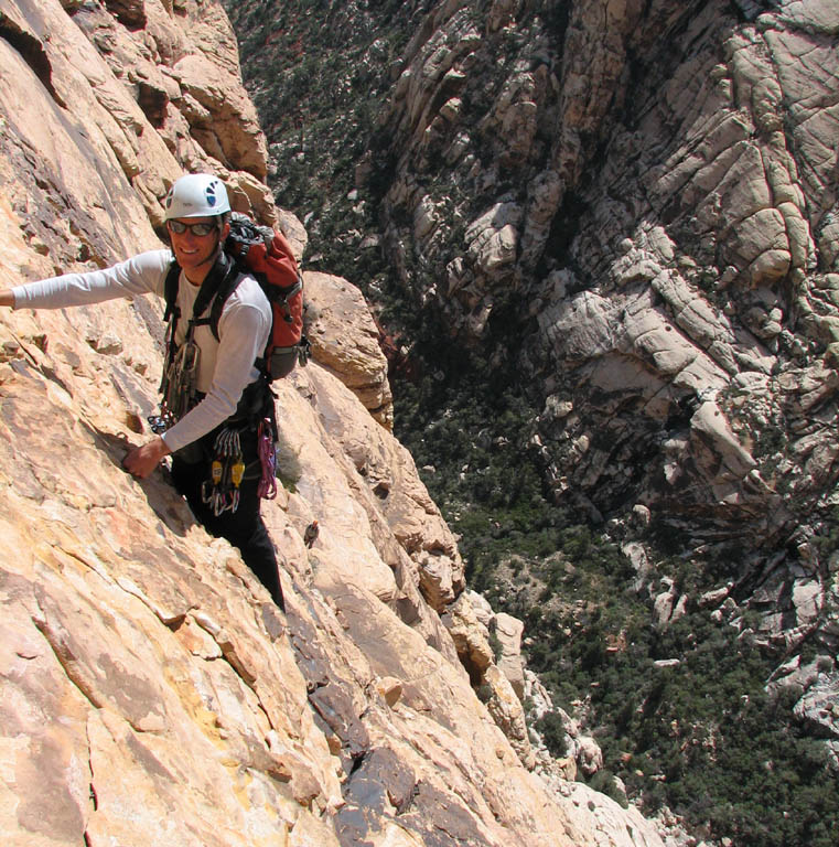 View down into the canyon from about 1000'.  The climber is Nate, a guide who was leading the party behind us. (Category:  Rock Climbing)