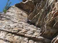 Leading Bonnie's Roof.  Just after pulling the crux. (Category:  Rock Climbing)